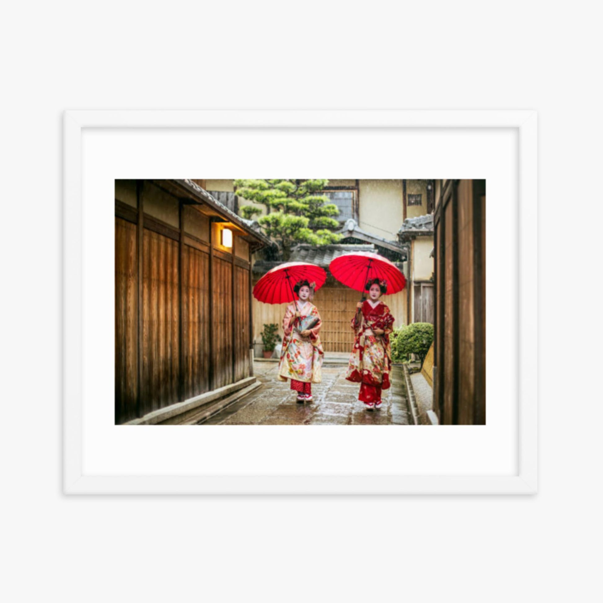 Geishas holding red umbrellas during rainy season 16x20 in Poster With White Frame