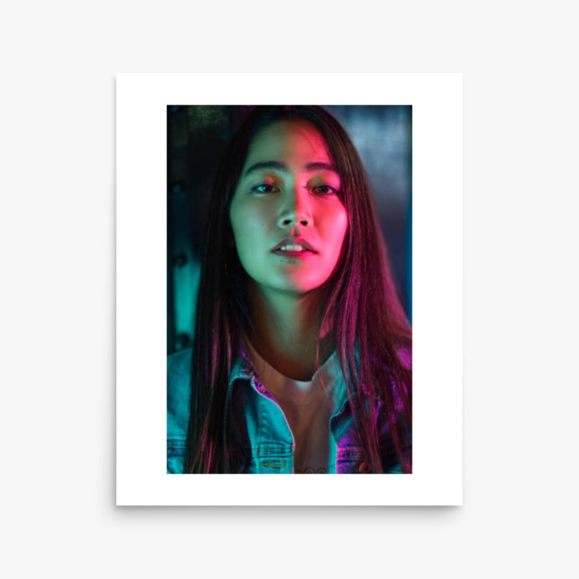 Portrait of young woman lit by colorful neon lights at night 16x20 in Poster